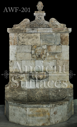 Antique reclaimed limestone wall fontain over 400 years old, reclaimed from the south of France