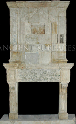 Antique stone fireplace with a top trumeau