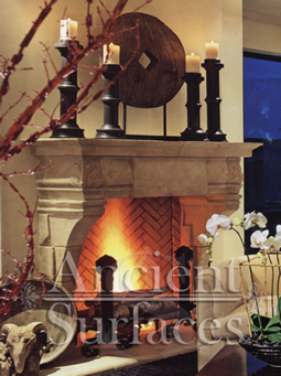 An elegant stone surround installed with a hearth and herringbone bricks inside the box