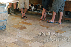 Antique reclaimed 'Arcane Stone' pavers salvaged from 17th centuries period homes from across the south of France and the Mediterranean European south. Installed in a old world Tuscan Italian style kitchen