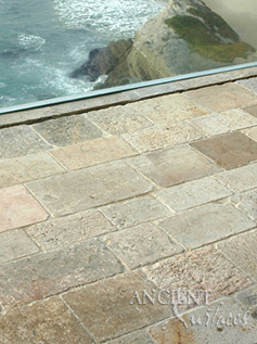 Ancient reclaimed Biblos Stone pavers shown installed on a kitchen floor in Rancho Santa Fe, CA