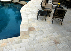 Antique Biblos Stone also named Biblical Stone, installed in a random pattern on the pool deck of a $10 million home in Newport Beach, CA