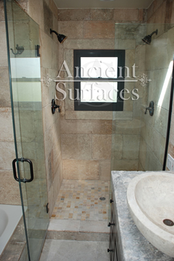 Kronos Limestone used in a master bathroom and shower floors and walls