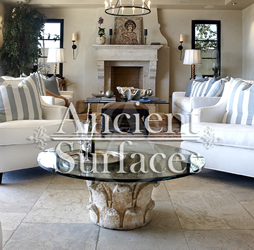Millenium Limestone flooring wide planks installed in a living room and family room of a mediterranean style coastal beach villa