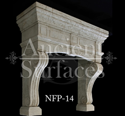 a hand carved kitchen hood stone surround