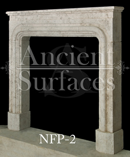 A simple Bolection fireplace hand carved out of French limestone