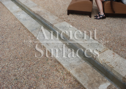 Antique thick Limestone slabs milled at 3" in thickness used as landscaping water channel and aqueducting bathroom, salvaged from the bottom of farm house foundations