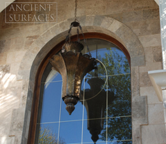 Kronos limestone cladding on the walls of a villa entrance