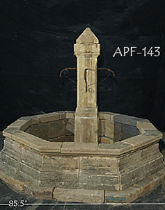 antique fountain transformed into a stone shower tub