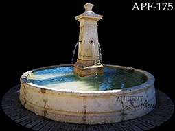 antique fountain transformed into a stone shower tub