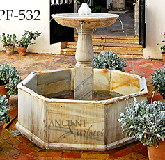 antique courtyard fountain out of stone