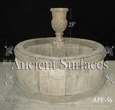 Antique rounded pool fountain from the 16th century with a middle pedestal and urn