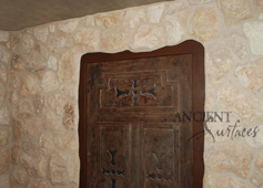 Umbrian Limestone cladding used on a kitchen wall cladding in a wine cellar