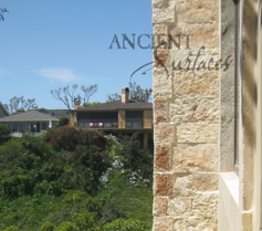 Mesa limestone cladding on the walls of a villa entrance