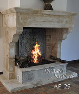 An antique Stone Fireplace by Ancient Surfaces