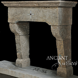 An antique Stone Fireplace by Ancient Surfaces