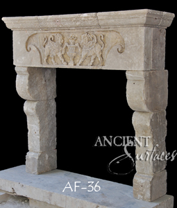 An antique Stone Fireplace by Ancient Surfaces