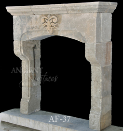 An antique Stone Fireplace by Ancient Surfaces