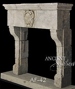 An antique Stone Fireplace by Ancient Surfaces