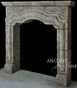 An antique Stone Fireplace by Ancient Surfaces