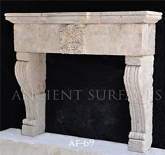 An antique Stone Fireplace by Ancient Surfaces