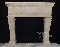 An antique Stone Fireplace by Ancient Surfaces