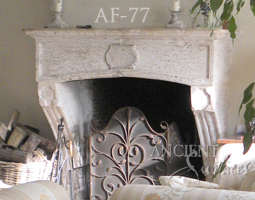 An antique Stone Fireplace by Ancient Surfaces