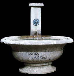 A beautiful 17th century antique reclaimed limestone wall fountain salvaged from the south of France