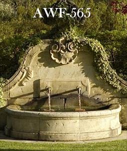 An antique limestone wall fountain with a medusa head mask reclaimed from Northern Europe circa 18th century