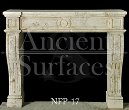 a directoire style hand carved fireplace mantel