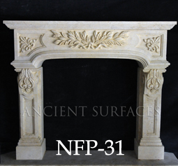 A simple Bolection fireplace hand carved out of French limestone with tapered legs