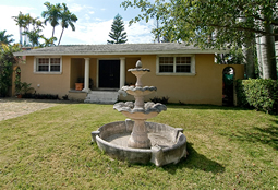 Hand carved rounded limestone pool fountain