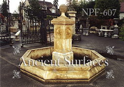 Hand carved lion headed limestone pool fountain 