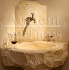 Unique farmhouse style avant-garde rough cleft sink hand carved out of a single antique limestone block ideal for any powder room or wine cellar type of application