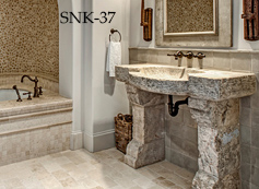 Antique reclaimed stone basin sink salvaged restored and installed in this traditional style Mediterranean home.